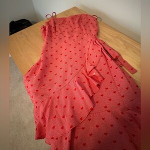 Cute red mini dress with hearts and ruffle crossover pattern!